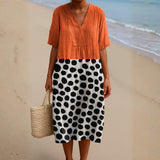 Penelope - Vestido Laranja com Pontos Contrastantes